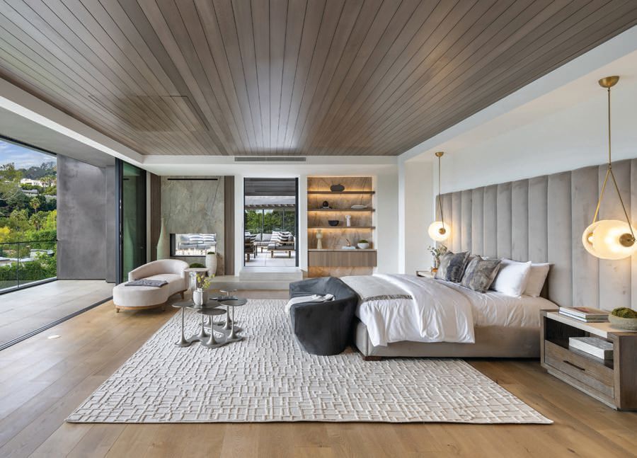 The primary suite inside this Bel-Air mansion features sweeping views, a camouflaged ceiling TV and automated doors—the perfect oasis for Angelenos to call home. PHOTO BY CHRISTOPHER AMITRANO