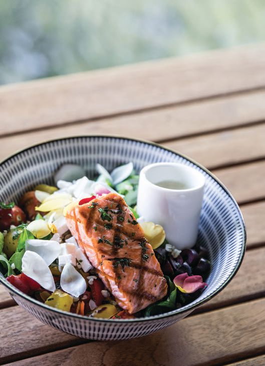 Fresh salmon salad with produce sourced from the on-property gardens PHOTO BY RHIANNON TAYLOR
