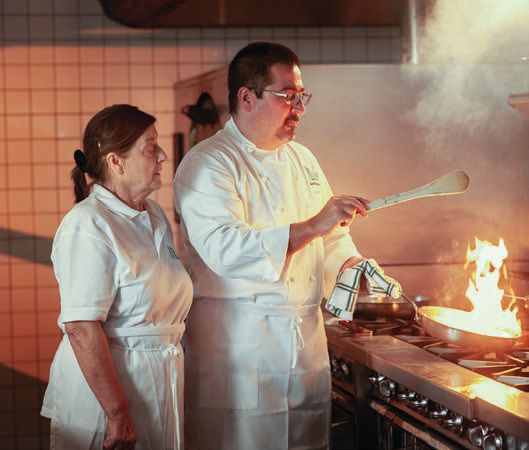 Elvira Buffoni and son Gianni Vietina prepare food at Madeo Ristorante. PHOTO: BY BILL BENNETT