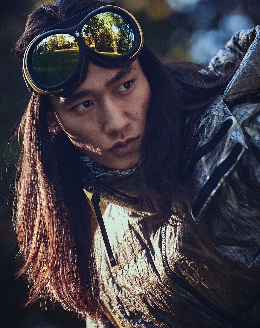 3 Moncler Grenoble double lens ski goggles; Moncler Grenoble downfilled ski jacket; moncler.com. Hair by Yoichi Tomizawa Makeup by Georgina Billington Models: Hong Lin, Major Model Management; Madani Ba, Major Model Management; Monique Jones, ONE Management; Shotaro Sugiyama, State Management Casting by XYNE Shot on location at Big SNOW at American Dream. PHOTOGRAPHED BY YOSSI MICHAELI
